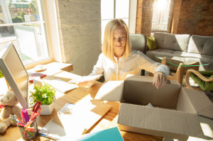 A young businesswoman moving in office, getting new work place